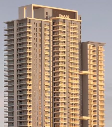 The tower crown and upper floors with stacked balconies
