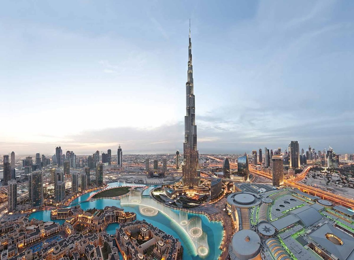 Burj Khalifa and Downtown Dubai at dusk — developed by Emaar