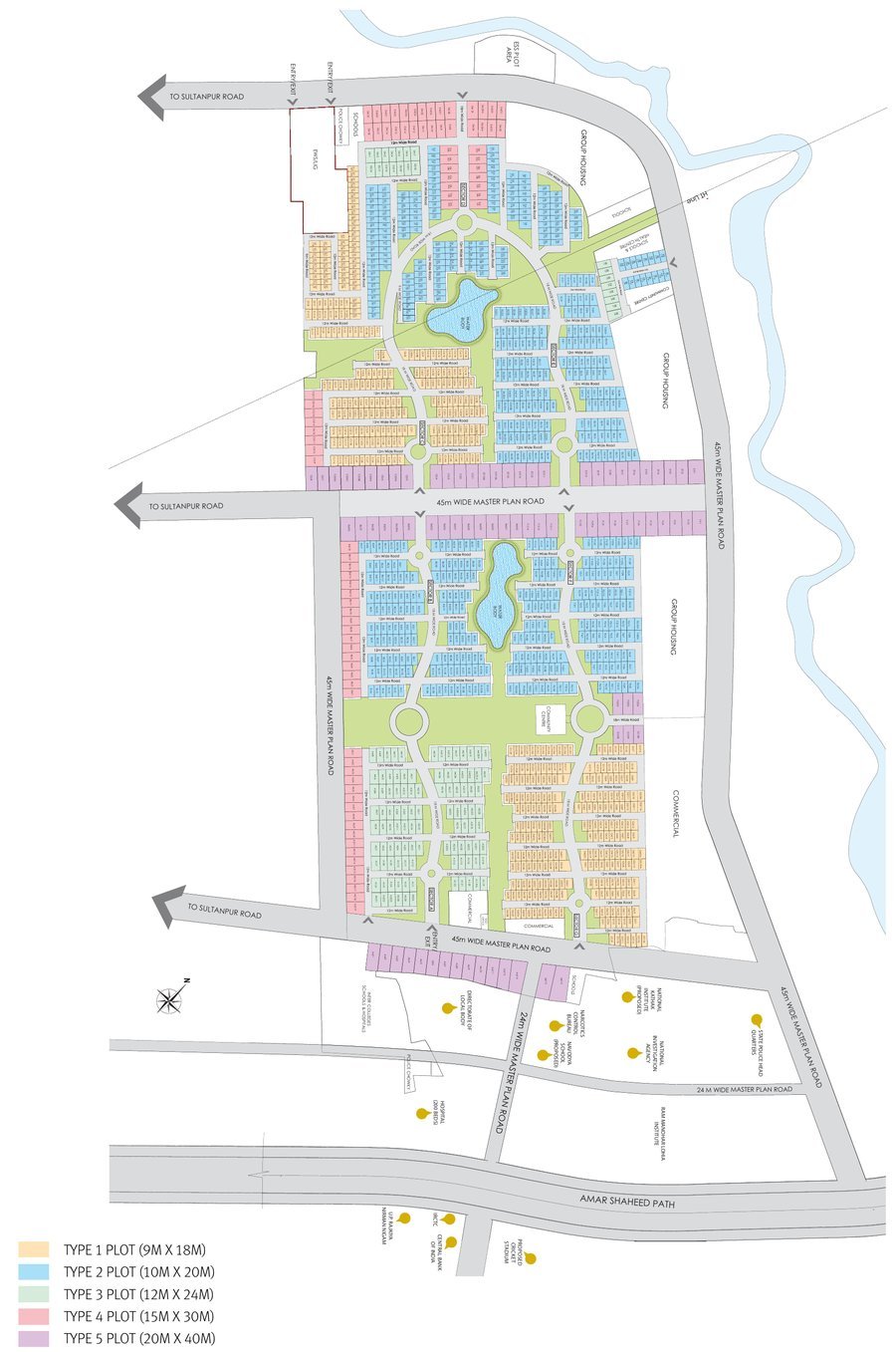Gomti Greens master plan with plots colour-coded by type, two water bodies in a central green spine